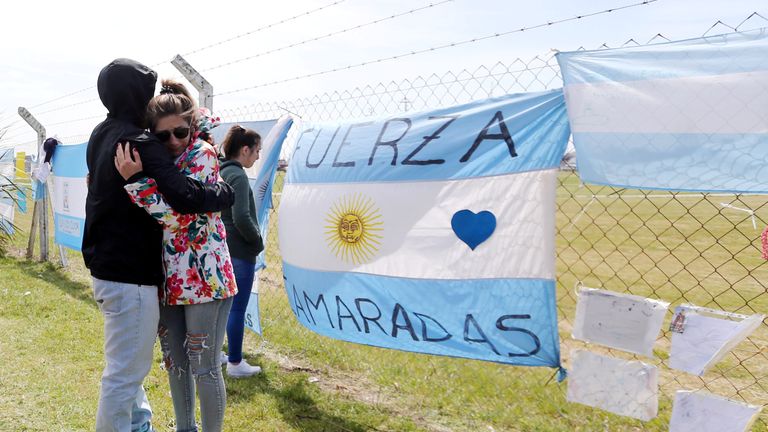 Relatives and friends of Tagliapietra, one of the 44 crew members of the missing at sea ARA San