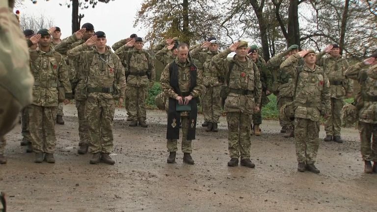 Soliders hold a two-minute silence on Salisbury Plain