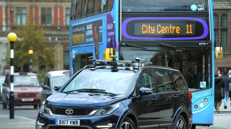 One of the vehicles navigates through Coventry city centre