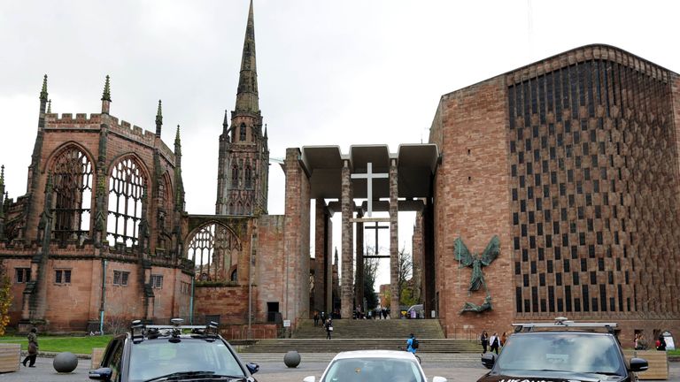 The cars involved in the trial in front of Coventry Cathedral