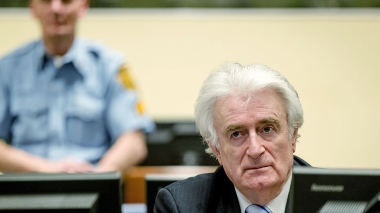 Ex-Bosnian Serb leader Radovan Karadzic sits in the court of the International Criminal Tribunal for former Yugoslavia (ICTY) in the Hague