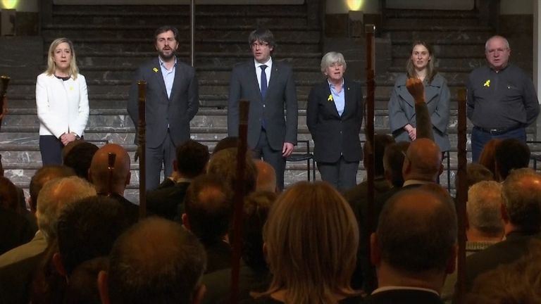 Mr Puigdemont and colleagues sang the Catalan national anthem 