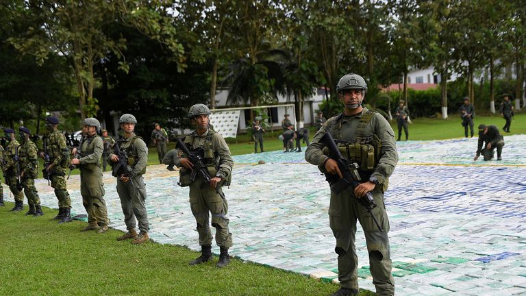 Dozens of heavily armed soldiers guarded the cocaine while it was put on display