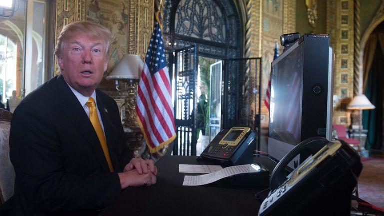US President Donald Trump prepares his traditional address to thank members of the US military via video teleconference on Thanksgiving day, November 23, 2017 from his residence in Mar-a-Lago in Florida