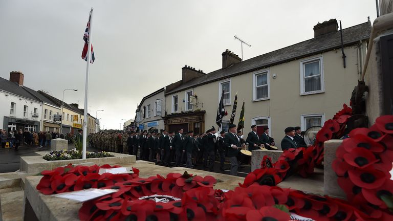 Soldiers and veterans parade during events to remember the 12 victims of the IRA&#39;s 1987 Remembrance Sunday bomb attack in Enniskillen, Co Fermanagh.