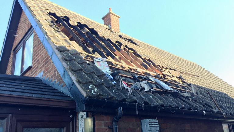 The firework hit the house's roof and caused a fire