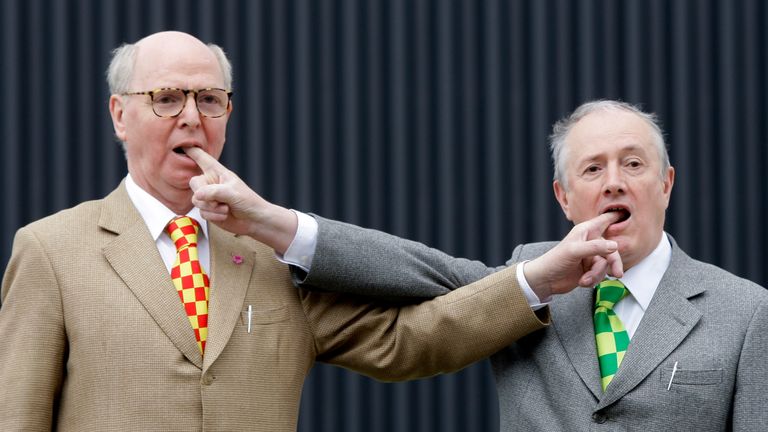 Gilbert & George pose for the cameras at the opening of a previous exhibition in Berlin