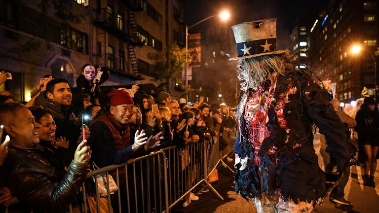 New Yorkers enjoy the annual Halloween Parade, despite Tuesday&#39;s terrorist attack in the city