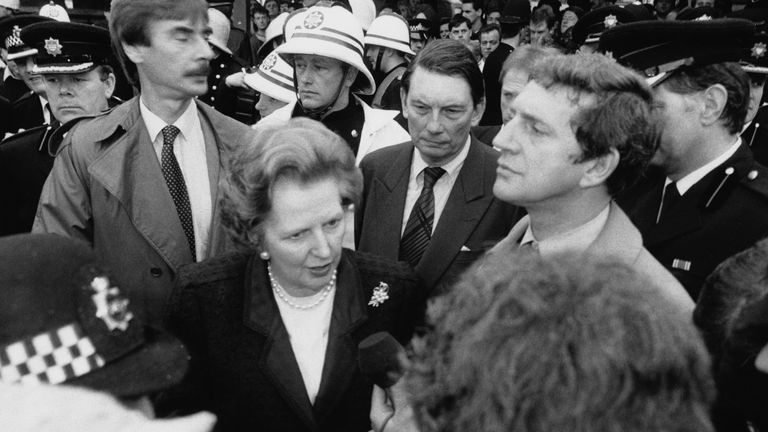 Prime Minister Margaret Thatcher and Transport Secretary Paul Channon (right) at the scene of the King&#39;s Cross Station fire