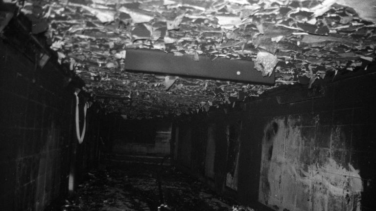 Melted roof tiles litter a subway tunnel after the fire at King&#39;s Cross Underground Station in London. 