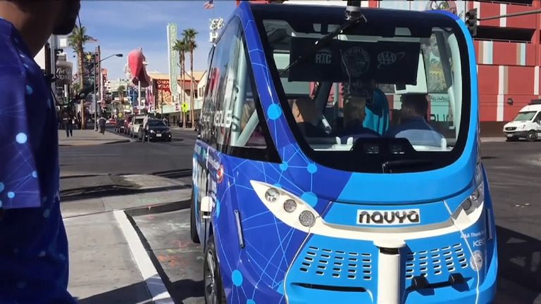 The driverless bus smoothly rolls into a parking space in Las Vegas