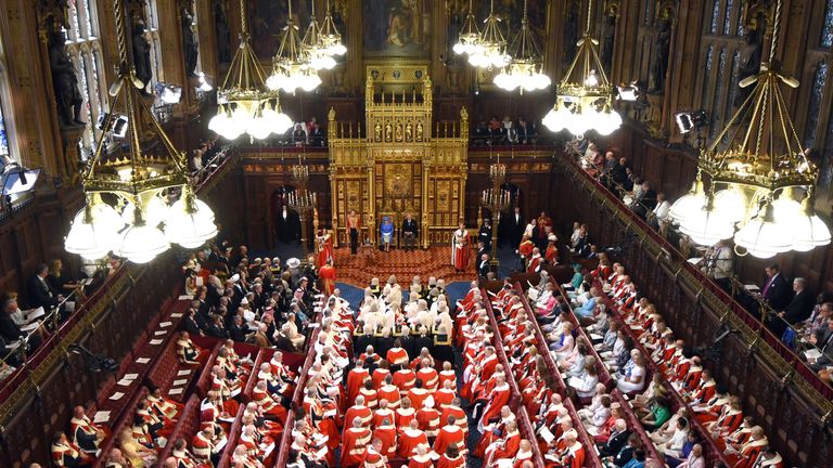 Queen Elizabeth II, accompanied by Prince Charles, Prince of Wales, makes a speech at the State Opening Of Parliament in the House of Lords on June 21, 2017