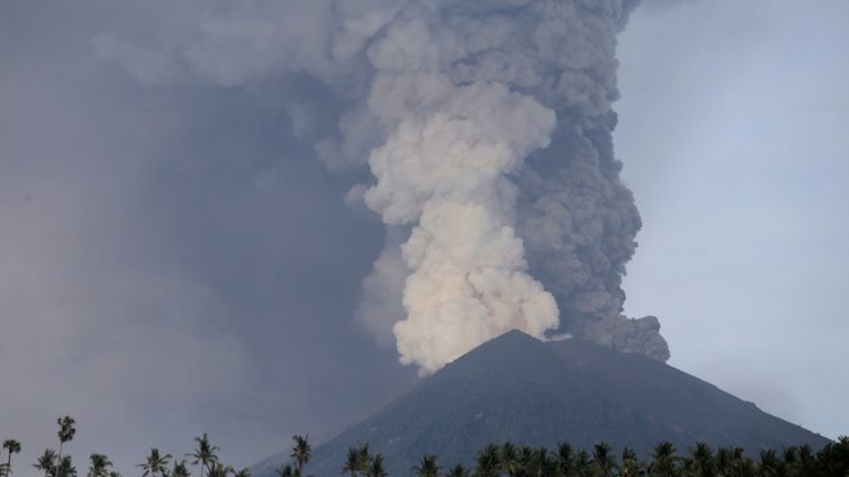 A view of Mount Agung volcano erupting from Culik village in Karangasem