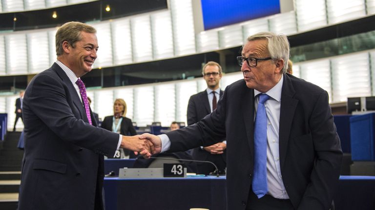 Nigel Farage shakes hands with European Commission President Jean-Claude Juncker