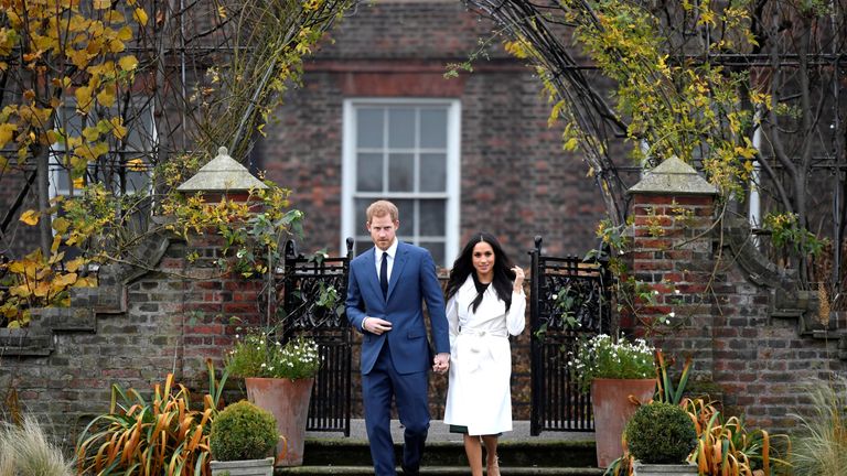 Prince Harry with Meghan Markle in the Sunken Garden of Kensington Palace