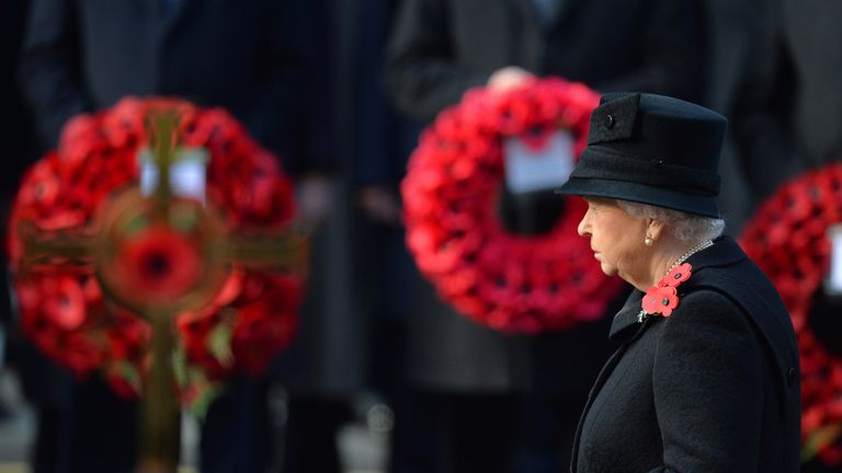 The Queen lays a wreath during the Remembrance Sunday service at the Cenotaph