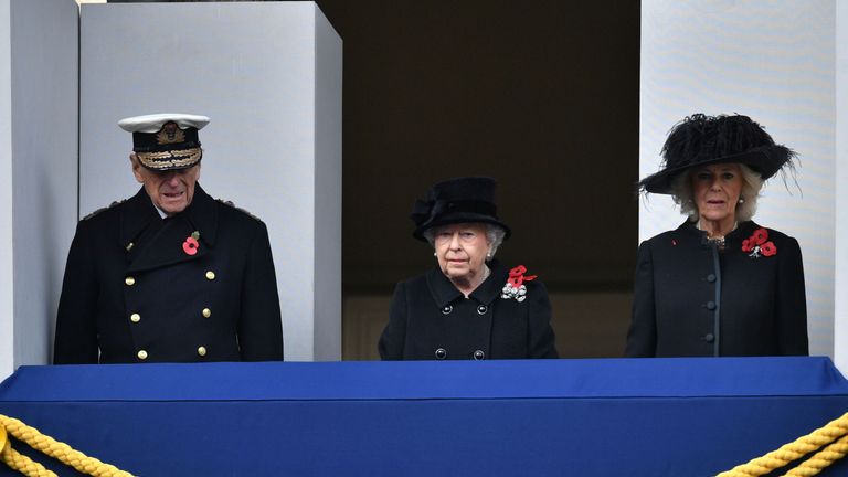 The Queen, Prince Philip and the Duchess of Cornwall watch from a Foreign Office balcony