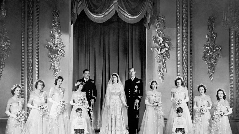 November 1947: Princess Elizabeth and the Duke of Edinburgh with their eight bridesmaids in the Throne Room at Buckingham Palace