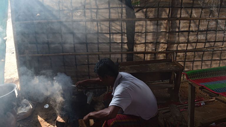 A Rohingya refugee cooks in a restaurant at the Thankhali refugee camp