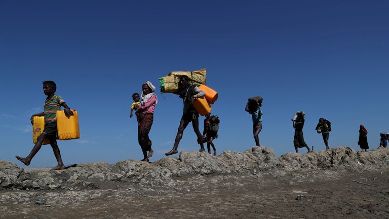 Refugees on foot at Sabrang near Teknaf, Bangladesh