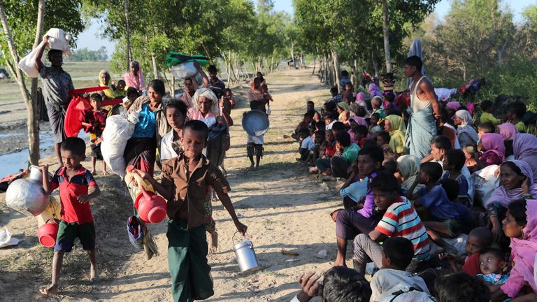 Rohingya refugees are temporarily detained at the Bangladesh border