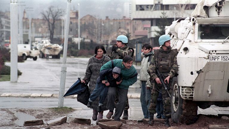 People dodge snipers during the siege of Sarajevo, which killed more than 10,000