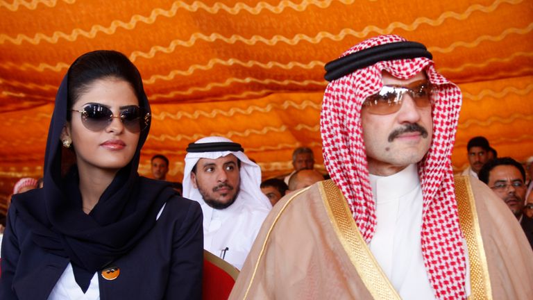 Saudi Prince al-Waleed bin Talal and his wife Princess Amira al-Taweel attend a ceremony for the opening...