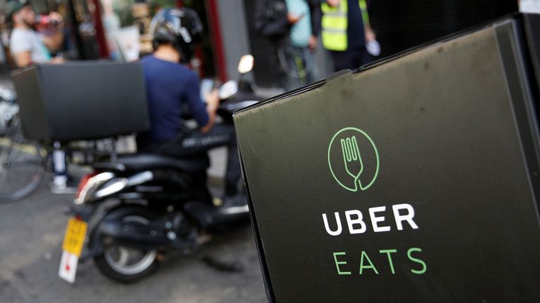 An UberEATS food delivery scooter is seen parked in London
