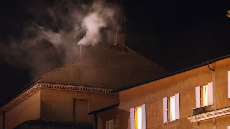 Smoke billows from St Peters Basilica when a new pope is chosen