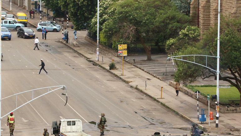 Soldiers stand on the streets in Harare, Zimbabwe