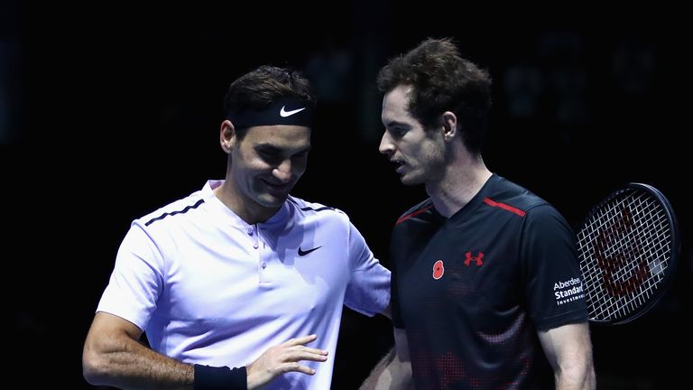 Andy Murray congratulates winner, Roger Federer on victory following their match during Andy Murray Live at The Hydro