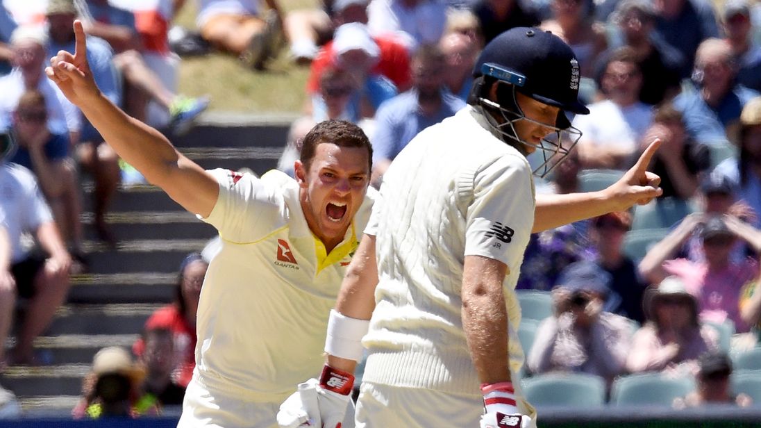 Australia&#39;s paceman Josh Hazlewood celebrates dismissing England batsman Chris Woakes on the final day of the second test