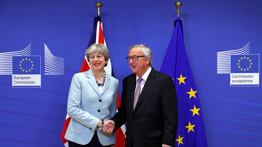 Theresa May is welcomed by European Commission President Jean-Claude Juncker