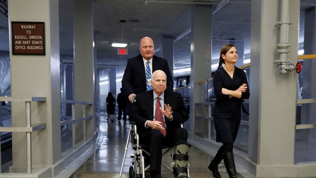 Senator John McCain heads to cast his vote on Capitol Hill earlier this month
