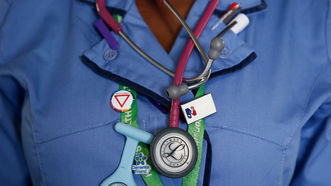 A nurse wears a watch and stethoscope at St Thomas' Hospital in central London January 28, 2015