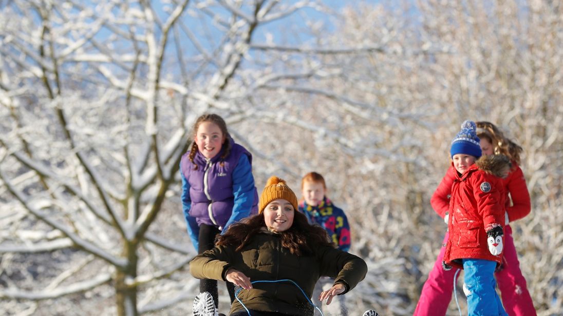 Children play in the snow in Newcastle-under-Lyme, Staffordshire