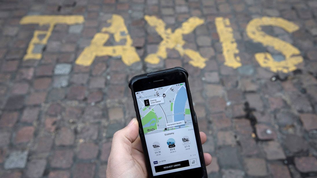 Taxi app Uber places limit on driver hours