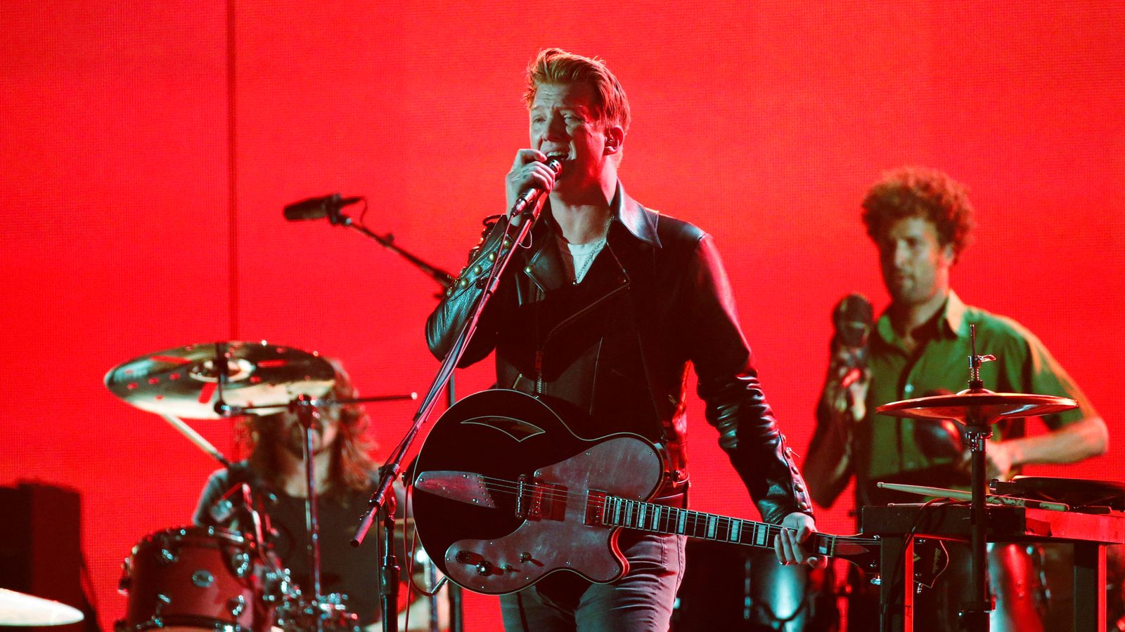 Queens Of The Stone Age frontman apologises after kicking photographer