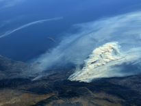 A photo taken from the International Space Station shows smoke rising from wildfires burning in Southern California. Pic: @AstroKomrade/NASA
