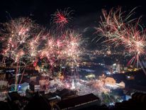 YOGYAKARTA, INDONESIA - JANUARY 01: Fireworks illuminate the city's skyline during New Year's Eve celebrations of 2018