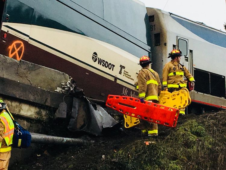 Emergency services at the scene in Washington after the train derailed. Pic: @PierceSheriff