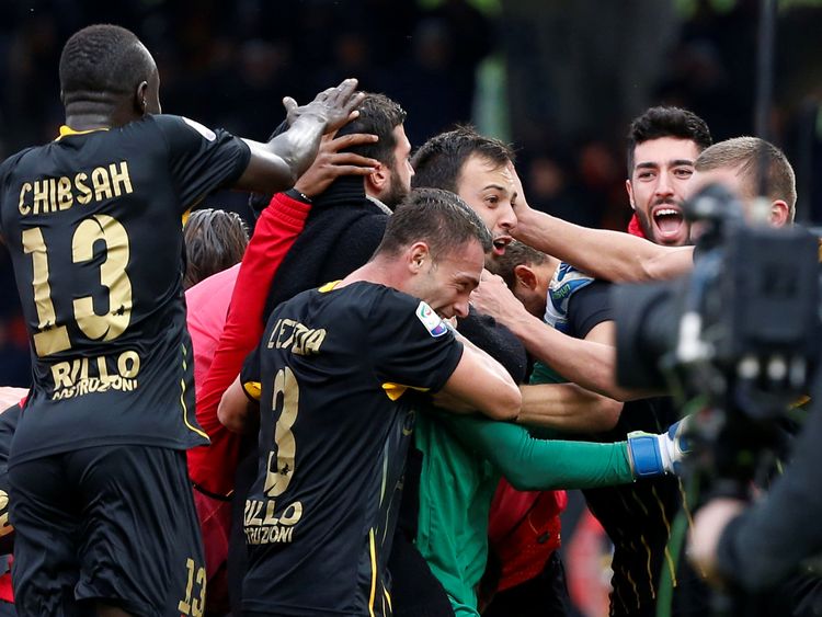  Alberto Brignoli is mobbed by his teammates