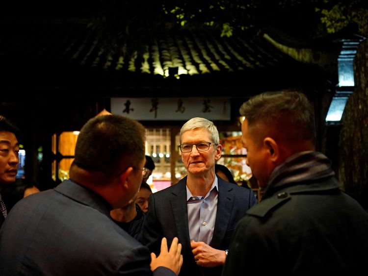 Apple CEO Tim Cook arrives for the 2017 World Internet Conference in China
