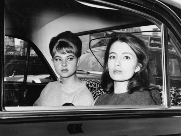Mandy Rice-Davies (left) and Christine Keeler leave court following the trial of Stephen Ward