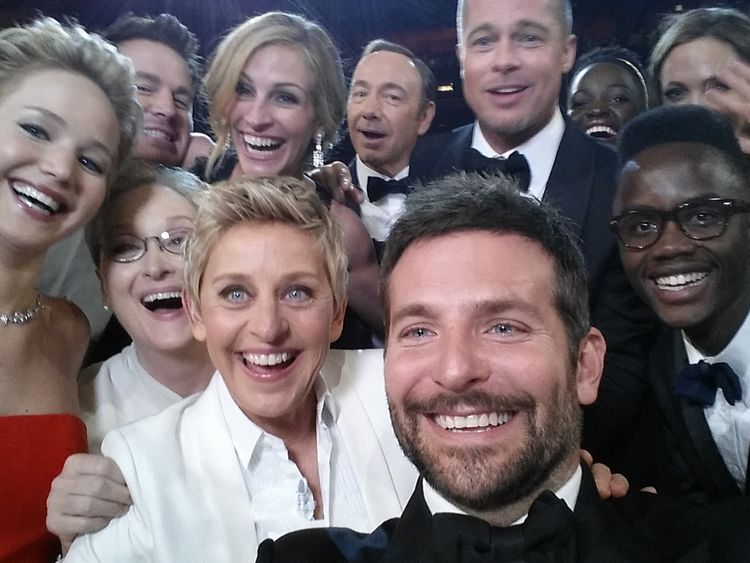 2014 Oscars host Ellen DeGeneres poses for a selfie taken by Bradley Cooper with (clockwise from L-R) Jared Leto, Jennifer Lawrence, Channing Tatum, Meryl Streep, Julia Roberts, Kevin Spacey, Brad Pitt, Lupita Nyong&#39;o, Angelina Jolie, Peter Nyong&#39;o Jr. and Bradley Cooper.