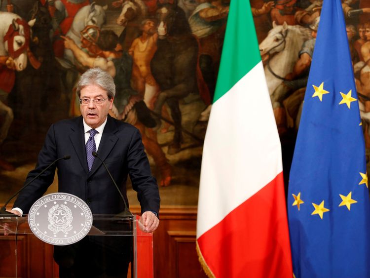 Italian Prime Minister Paolo Gentiloni attends a news conference 23 December