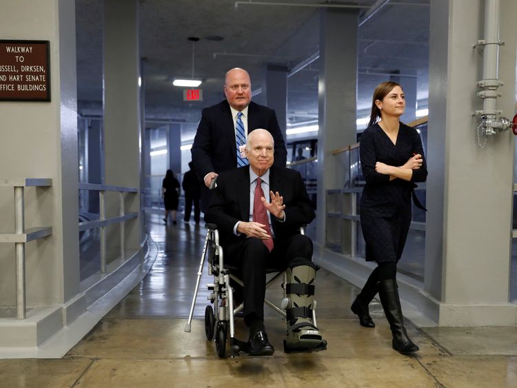 Senator John McCain heads to cast his vote on Capitol Hill earlier this month