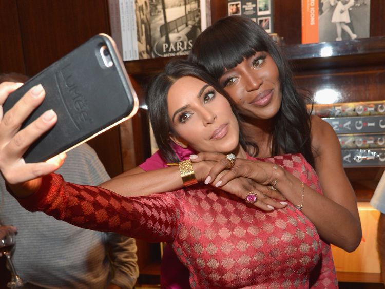Kim Kardashian and model Naomi Campbell take a selfie during the Los Angeles launch of &#39;Naomi&#39; at Taschen Beverly Hills on April 28, 2016 in Beverly Hills, California. 