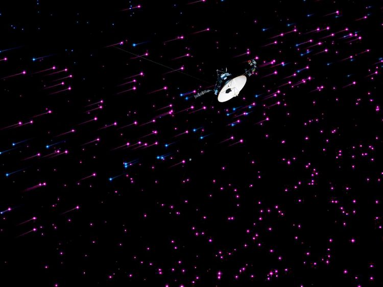 An artist's concept shows Voyager 1 exploring the solar system's 'magnetic highway'