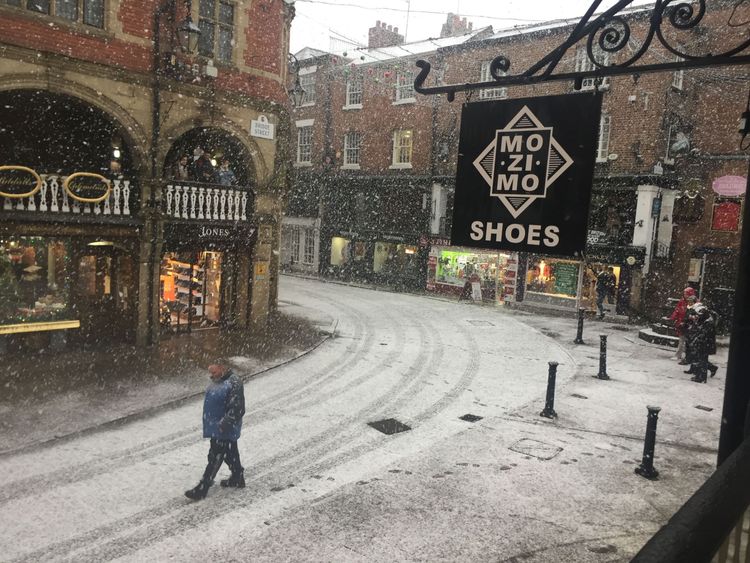 Snow falls in Chester, as parts of Britain woke up to a blanket of snow caused by an Arctic airflow in the wake of Storm Caroline